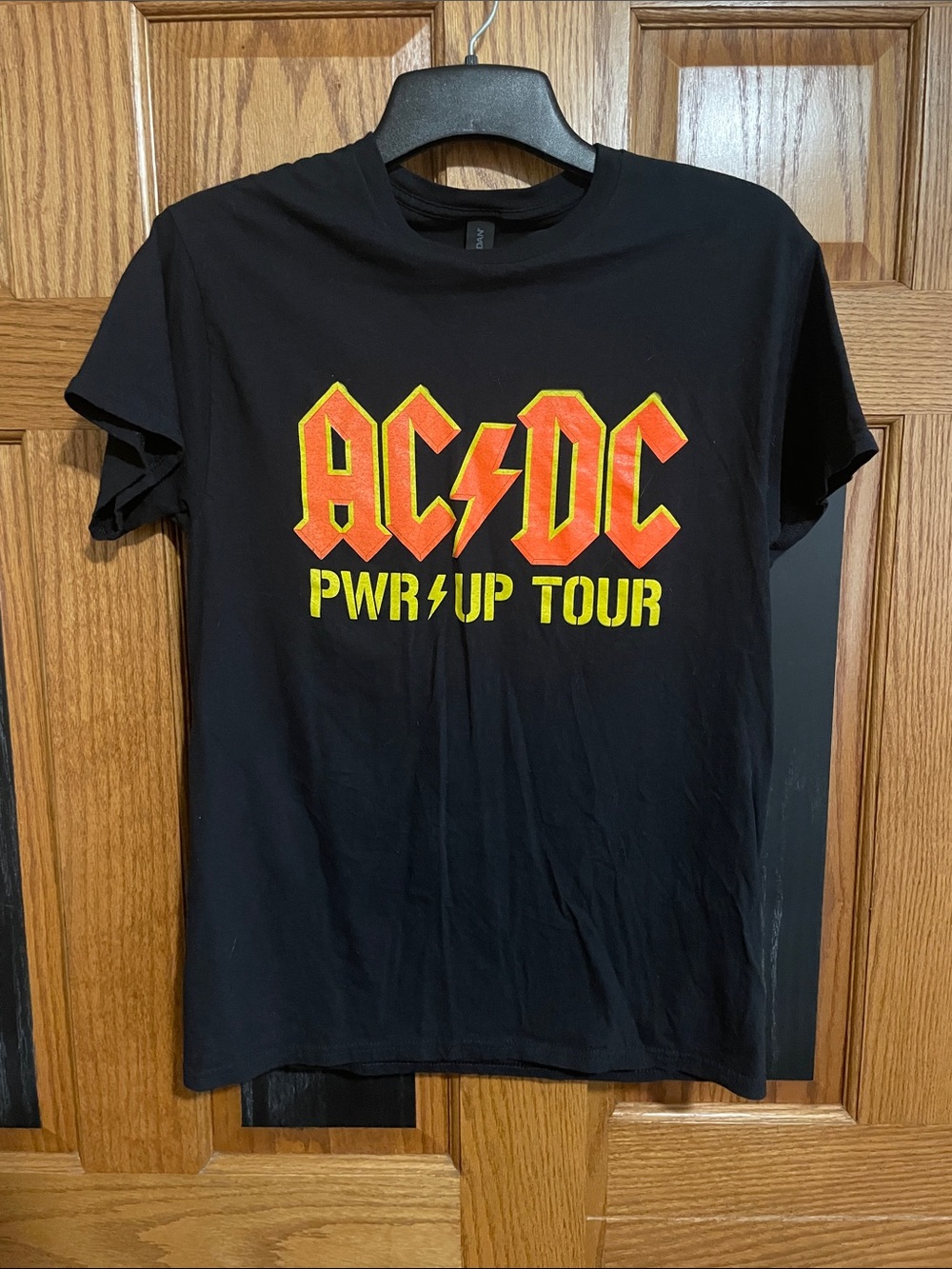 AC/DC 2025 Tour Black Men’s Short Sleeve Tee with Red and Yellow Logo